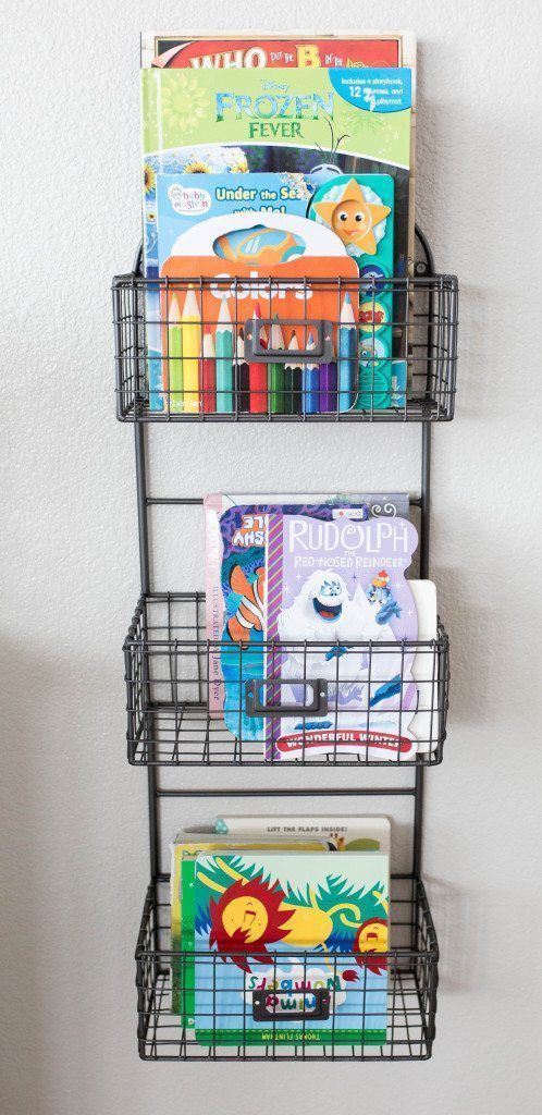 I love this farmhouse craft table combined with colorful ottoman seats and rounded shelving! Perfect atmosphere for play and homeschool learning