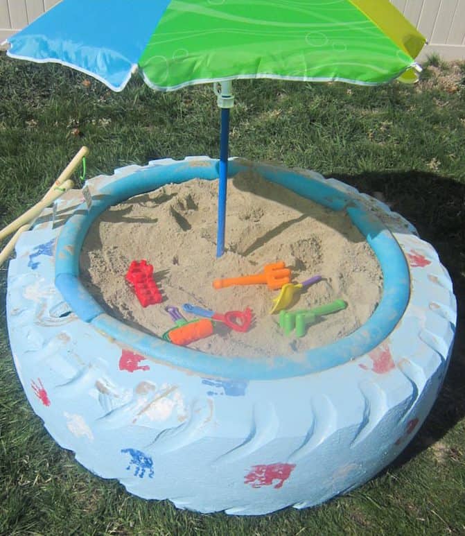 diy tire sandbox, kid friendly backyard ideas on a budget