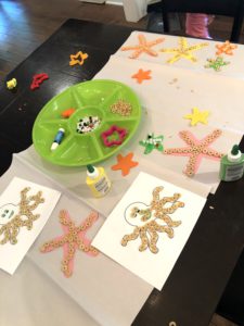 Starting Early With Toddler Fine Motor Skills Activities Is An Absolute Must! This Star Fish Decorating Craft Is A Super Easy Way To Practice Those Fine Motor Skills That Can Help With Development.