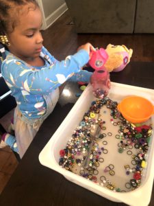 Looking for an Awesome Sensory Activity for Toddlers? Well This Bean Sensory Activity Is An Absolute Must! This Bead Sensory Bin Activity Is A Super Easy Way To Have Tons of Fun.