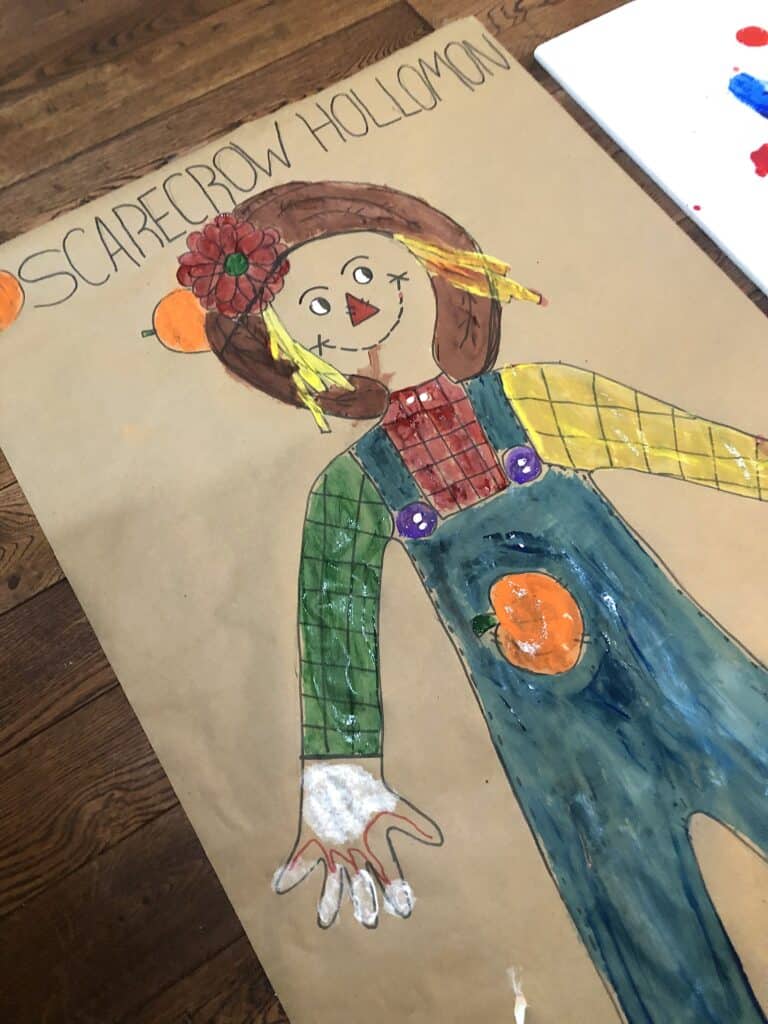 This Giant Scarecrow is Such A Fun Fall Craft Idea For Kids! Fall Crafts Are Awesome, But This Activity Is One Of The Best. It's Great For All Ages and Occupies The Kids For A Great Family Activity.