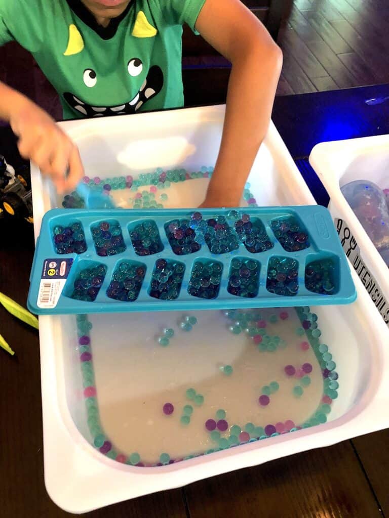 Looking for Sensory Activities That Toddlers Will Love? Well Check Out This Water Bead Sensory Bin Activity That Will Keep Your Child Occupied and Learning!