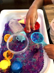 Looking for Sensory Activities That Toddlers Will Love? Well Check Out This Water Bead Sensory Bin Activity That Will Keep Your Child Occupied and Learning!