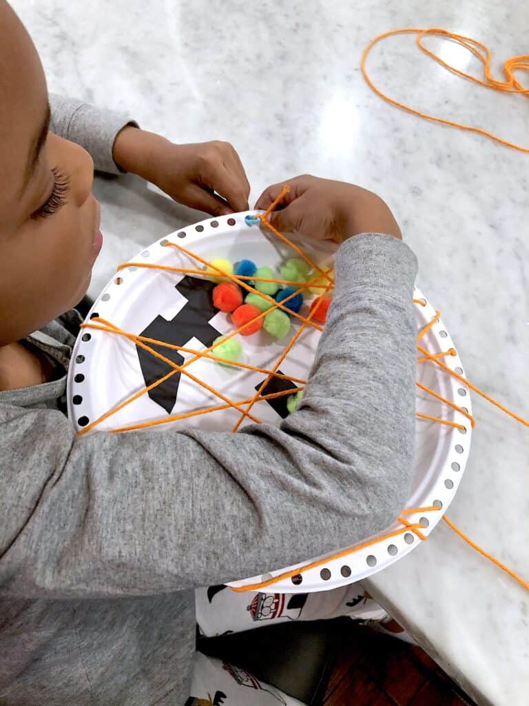 Create Some Amazing Memories This October With Super Fun Halloween Crafts For Kids! This Simple Paper Plate Craft Is Easy Enough For Young Kids To Practice Fine Motor Skills & Fun For Older Kids Too!