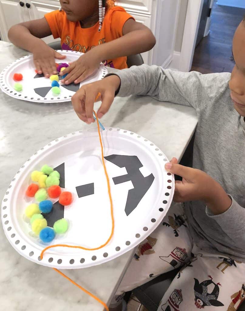 Create Some Amazing Memories This October With Super Fun Halloween Crafts For Kids! This Simple Paper Plate Craft Is Easy Enough For Young Kids To Practice Fine Motor Skills & Fun For Older Kids Too!