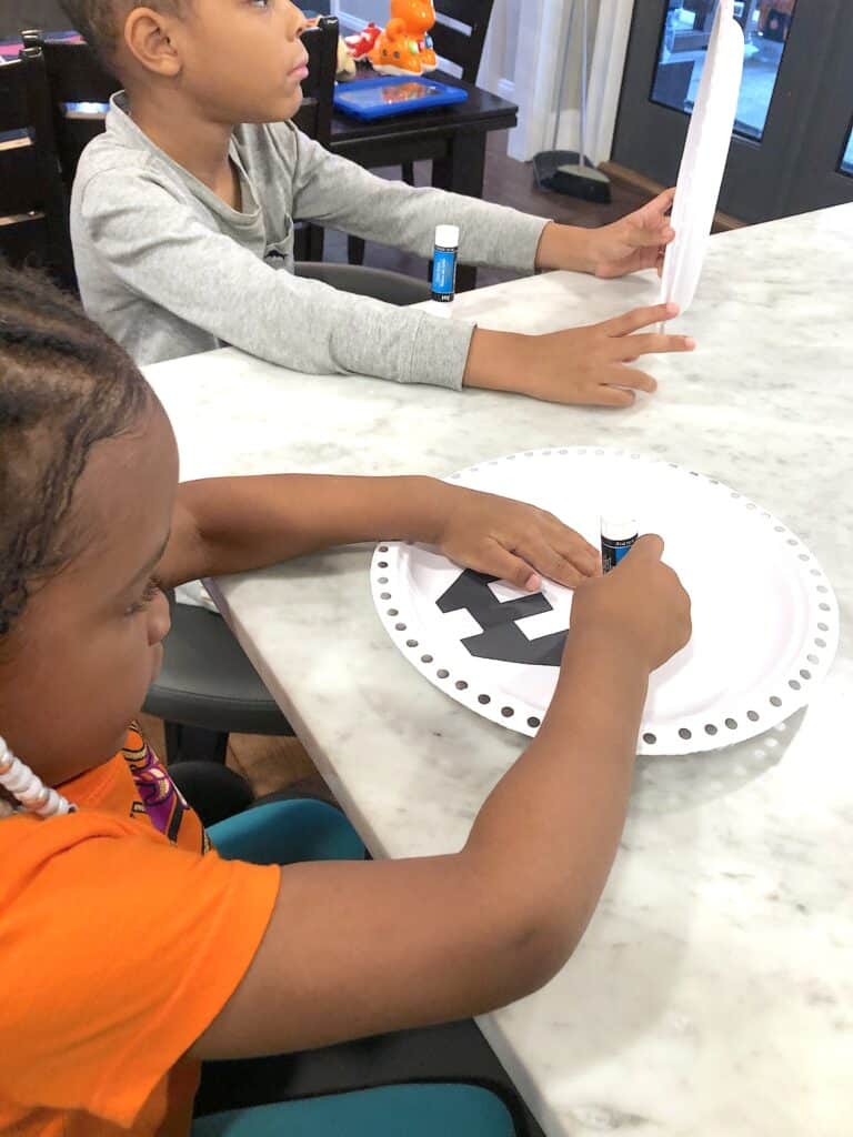 Create Some Amazing Memories This October With Super Fun Halloween Crafts For Kids! This Simple Paper Plate Craft Is Easy Enough For Young Kids To Practice Fine Motor Skills & Fun For Older Kids Too!